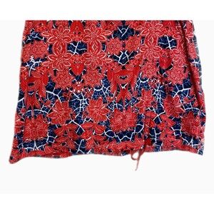 Women’s golf skort.  Size medium.  Stretchy blue and orangish red.
